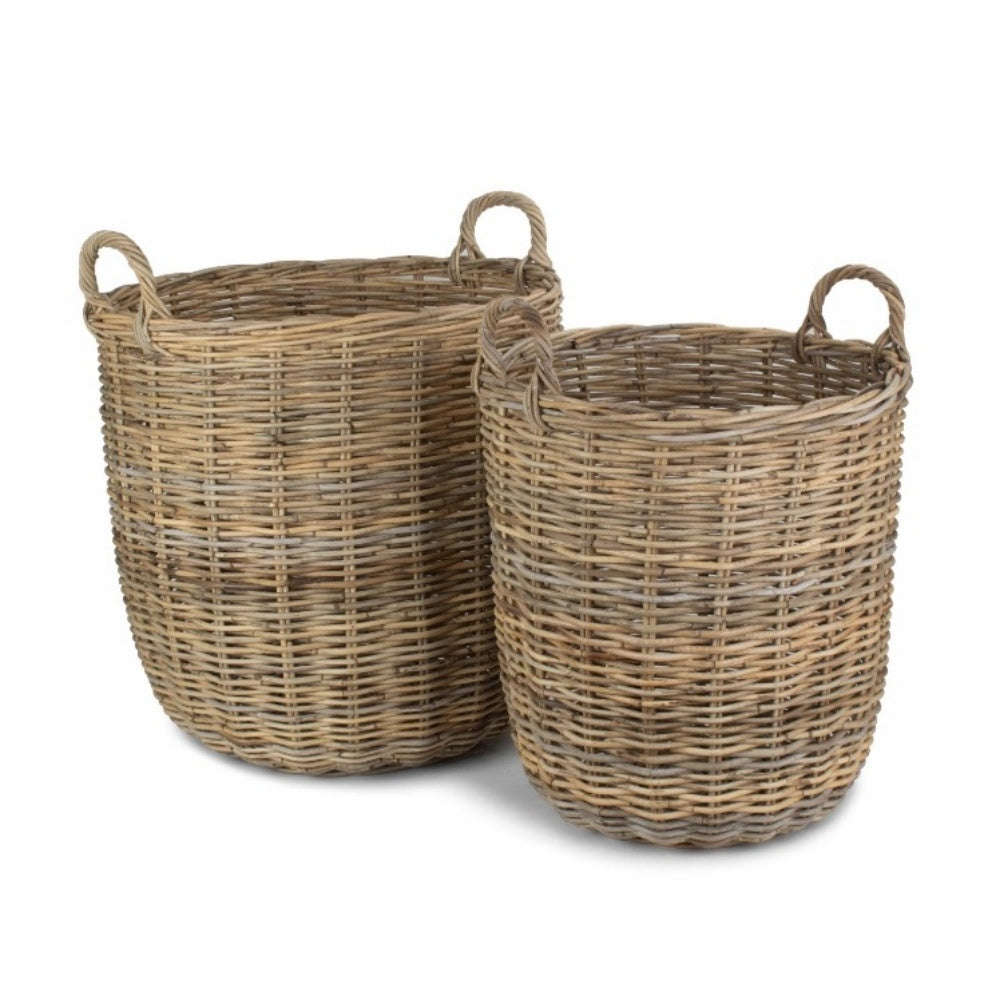 Grand panier à bûches rond en rotin gris au coin du feu