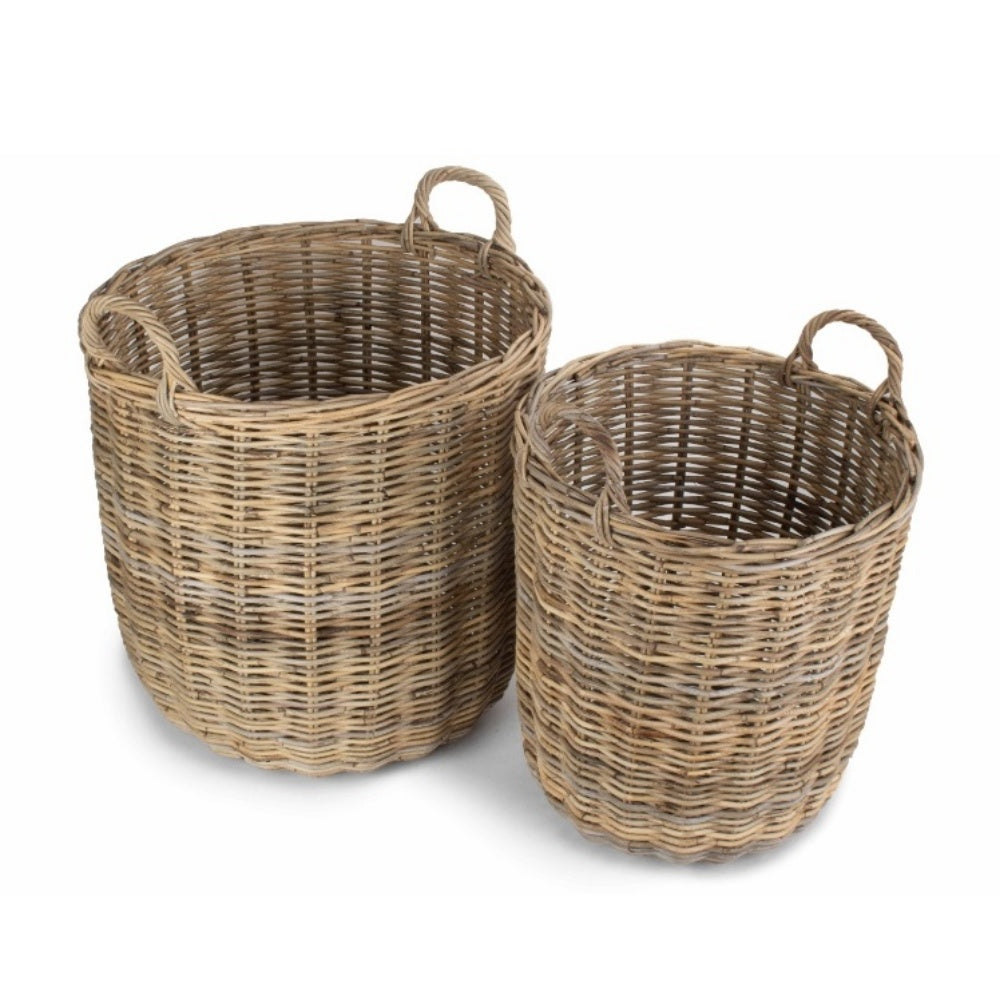 Grand panier à bûches rond en rotin gris au coin du feu