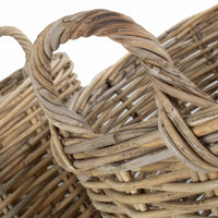 Grand panier à bûches rond en rotin gris au coin du feu