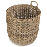 Grand panier à bûches rond en rotin gris au coin du feu