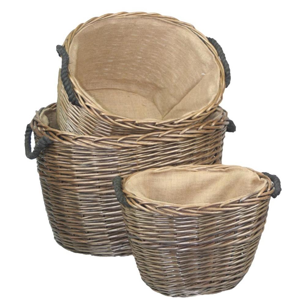 Ovaler, mit Sackleinen ausgekleideter Weidenholzkorb